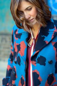 Anna Roufos Sosa in a Gucci coat and Frame blouse.