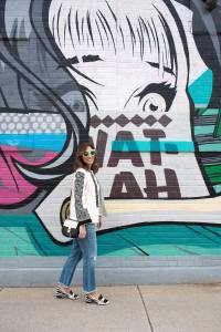 Anna Roufos Sosa of Noir Friday in a 10 Crosby Derek Lam jacket and Gucci shoes and sunglasses.