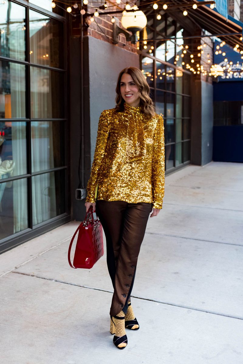 Anna Roufos Sosa of Noir Friday having the holiday afternoon tae at Soho House Chicago in a MSGM top.