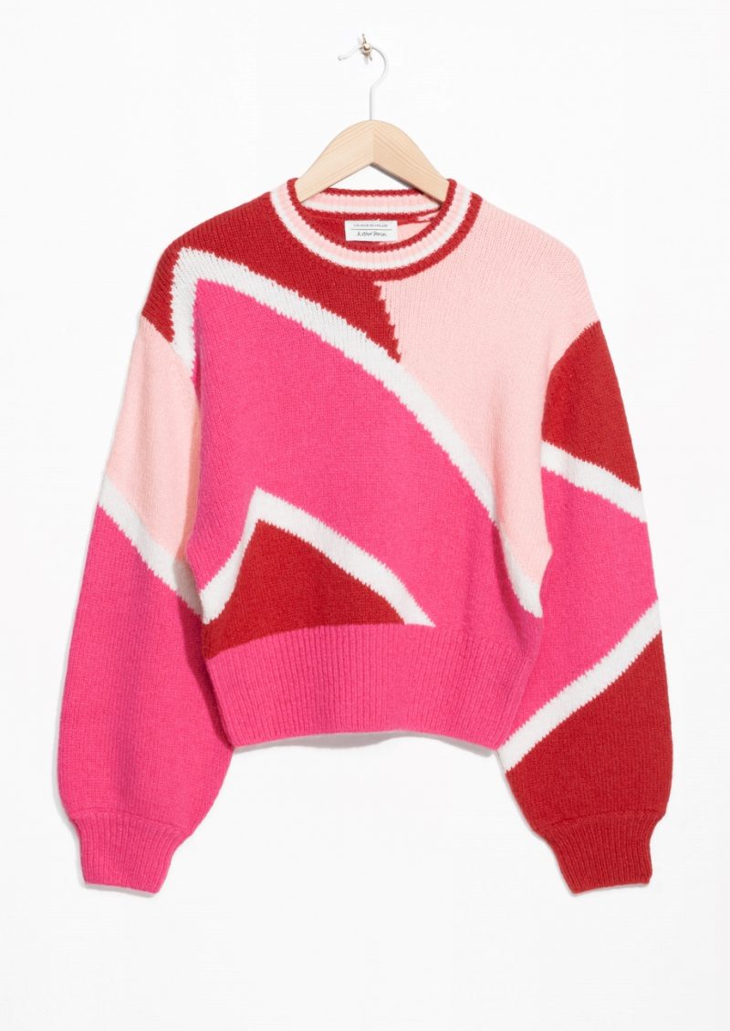Anna Roufos Sosa features this pink and red sweater from And Other Stories for the Noir Friday Deal of the Day.