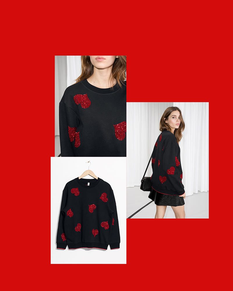 Anna Roufos Sosa features this sequin heart sweater from And Other Stories for the Noir Friday Deal of the Day.