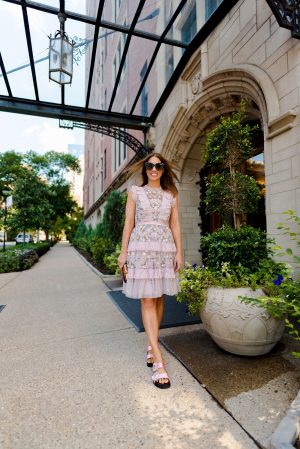 Anna Roufos Sosa of Noir Friday in a Needle & Thread dress and Roger Vivier sandals.
