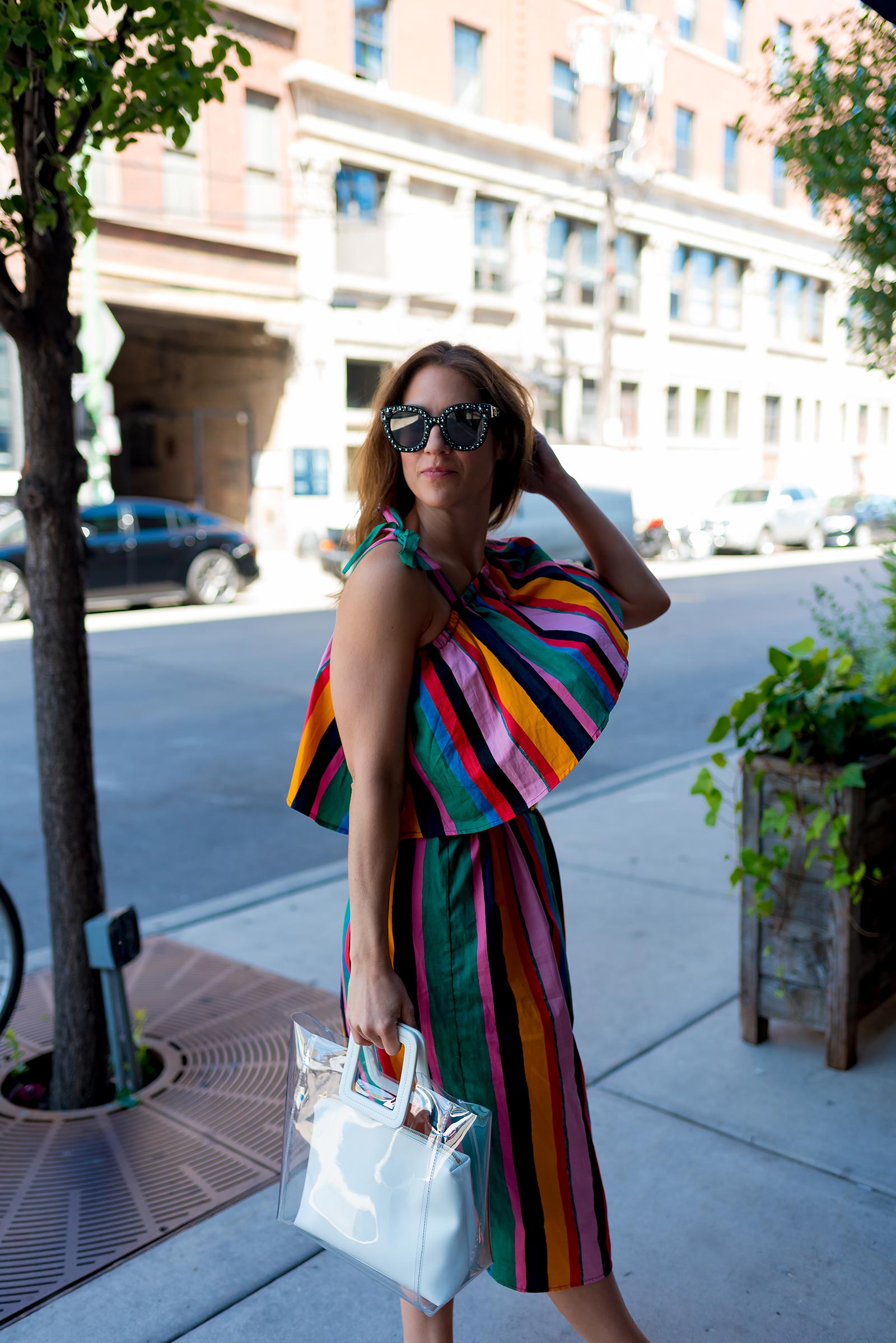 Anna Roufos Sosa of Noir Friday wearing a Who What Wear dress and Staud bag.